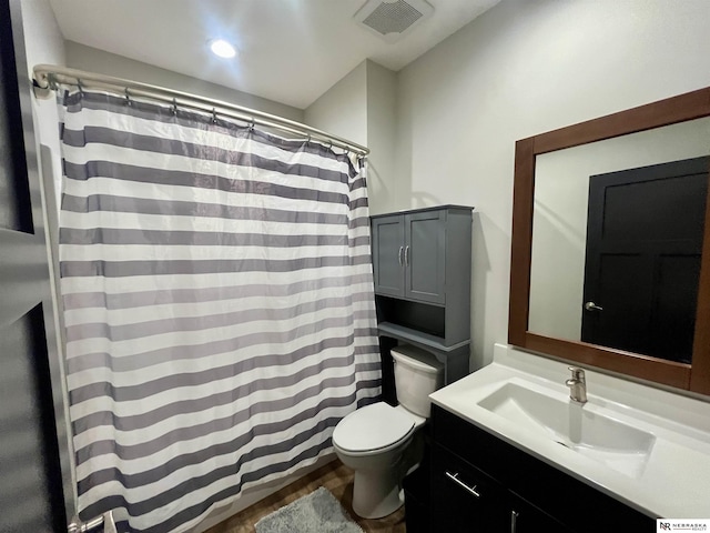 1001 Trail Dr, Valentine, NE 69201 - bathroom with toilet, vanity, and recessed lighting