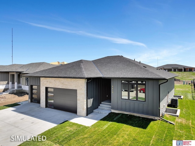 9350 S 86th St, Lincoln, NE 68526 - view of front of house featuring board and batten siding, roof with shingles, an attached garage, concrete driveway, and a front yard