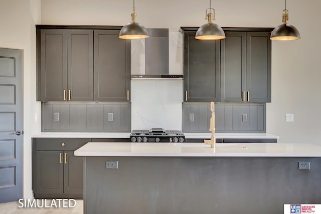 9350 S 86th St, Lincoln, NE 68526 - kitchen featuring wall chimney range hood, tasteful backsplash, light countertops, and pendant lighting