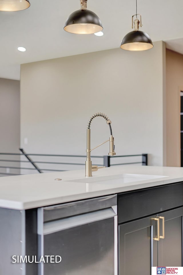 9350 S 86th St, Lincoln, NE 68526 - kitchen featuring stainless steel dishwasher, light countertops, gray cabinetry, hanging light fixtures, and recessed lighting