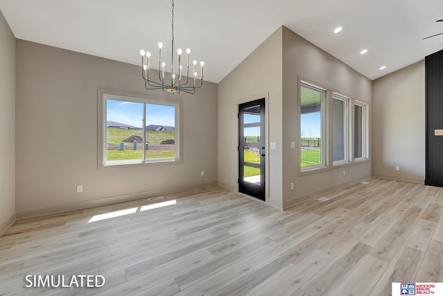 9350 S 86th St, Lincoln, NE 68526 - unfurnished dining area with light wood finished floors, a chandelier, vaulted ceiling, baseboards, and recessed lighting
