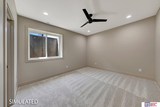 9350 S 86th St, Lincoln, NE 68526 - carpeted spare room featuring a ceiling fan, baseboards, and recessed lighting