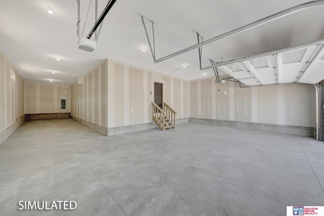 9350 S 86th St, Lincoln, NE 68526 - garage featuring a garage door opener