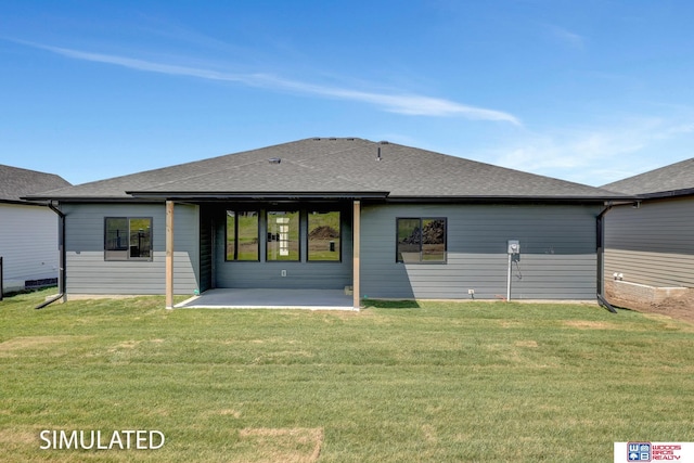 9350 S 86th St, Lincoln, NE 68526 - rear view of property with a patio area, a yard, and a shingled roof