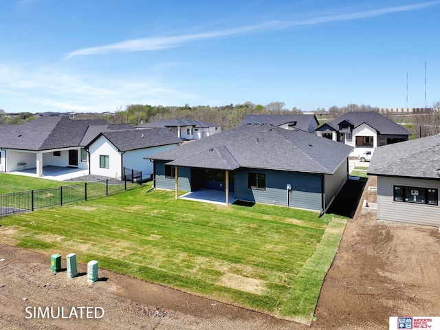 9350 S 86th St, Lincoln, NE 68526 - back of property featuring a residential view, a patio area, and a shingled roof