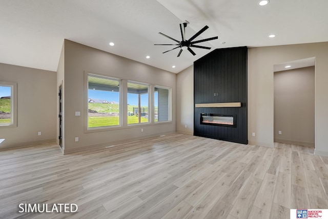 9350 S 86th St, Lincoln, NE 68526 - unfurnished living room with vaulted ceiling, plenty of natural light, light wood-style floors, ceiling fan, and a large fireplace