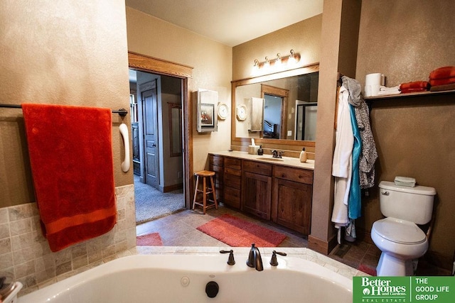 3860 Shady Bend Rd, Grand Island, NE 68801 - full bathroom featuring a tub with jets, vanity, and toilet