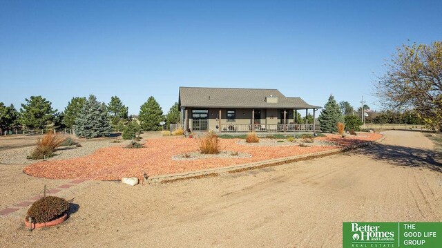 3860 Shady Bend Rd, Grand Island, NE 68801 - farmhouse-style home featuring covered porch