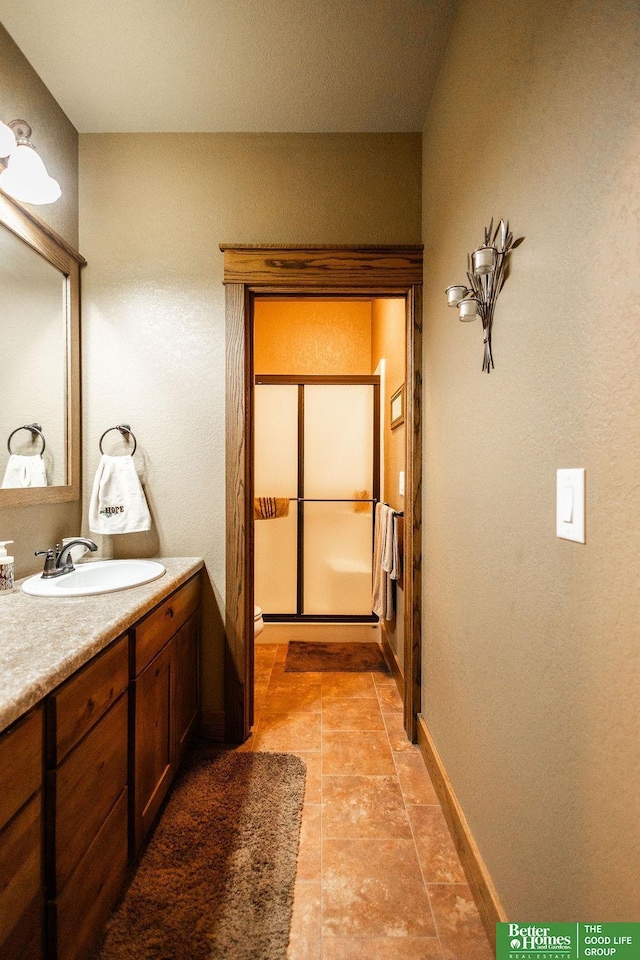 3860 Shady Bend Rd, Grand Island, NE 68801 - bathroom featuring vanity and baseboards