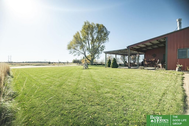 3860 Shady Bend Rd, Grand Island, NE 68801 - view of grassy yard featuring a pole building and an outbuilding