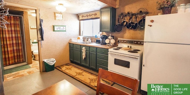 3860 Shady Bend Rd, Grand Island, NE 68801 - kitchen with white appliances, a sink, a textured ceiling, and light countertops