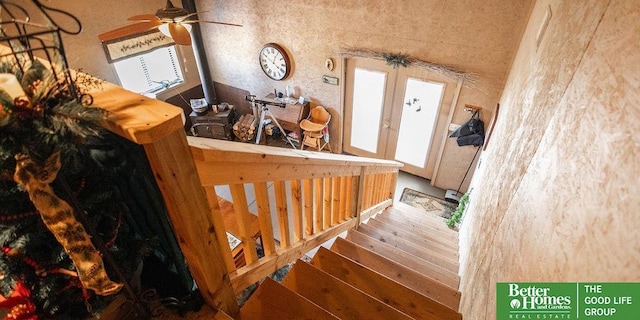 3860 Shady Bend Rd, Grand Island, NE 68801 - stairs featuring ceiling fan, wood finished floors, and french doors