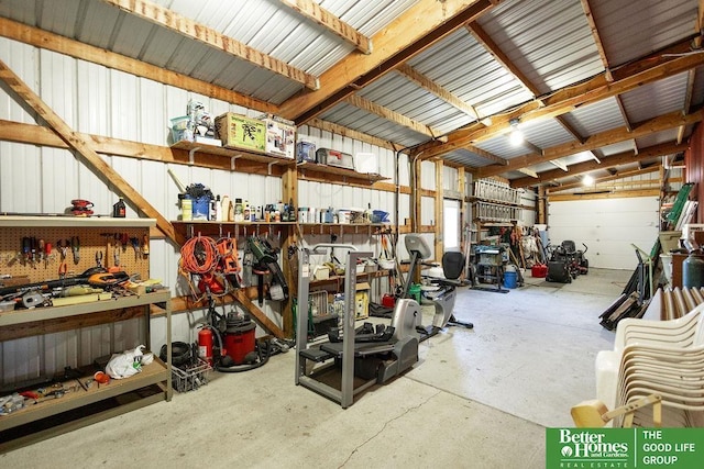 3860 Shady Bend Rd, Grand Island, NE 68801 - garage featuring a workshop area and metal wall