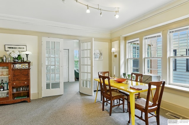 115 N 38th Ave, Omaha, NE 68131 - dining area with french doors and carpet floors