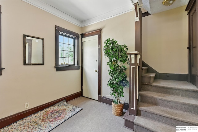 115 N 38th Ave, Omaha, NE 68131 - foyer featuring carpet flooring, stairs, and crown molding