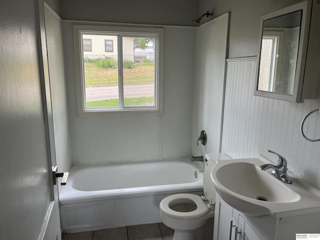 6796 Charles St, Omaha, NE 68132 - bathroom featuring tile patterned flooring, vanity, toilet, and shower / bathtub combination