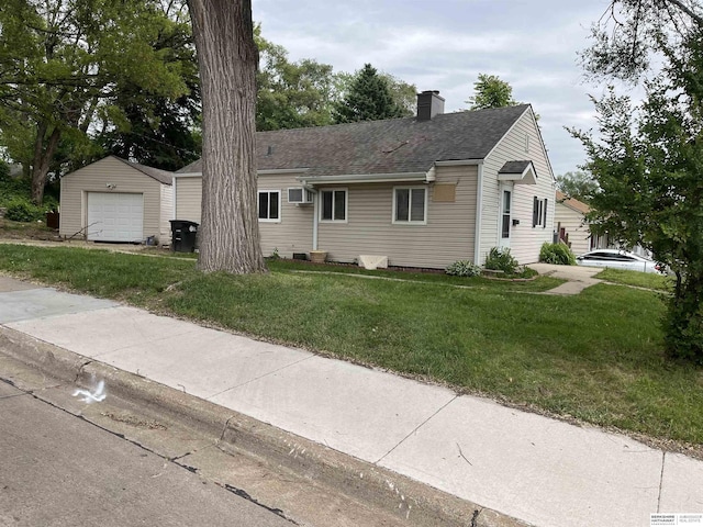 6796 Charles St, Omaha, NE 68132 - ranch-style house featuring a detached garage, a chimney, a front yard, and a shingled roof