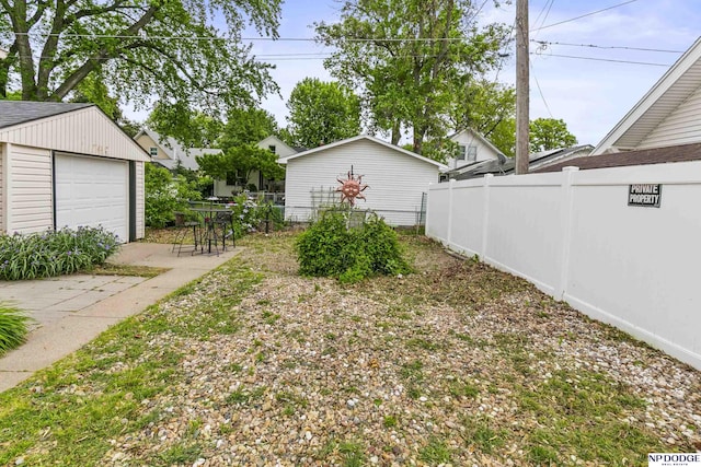 2026 N Park Ave, Fremont, NE 68025 - view of yard with an outbuilding and a garage