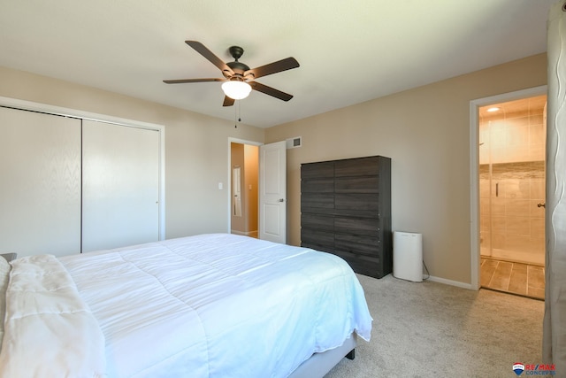 2430 Jameson St S, Lincoln, NE 68512 - bedroom with carpet, a closet, ensuite bath, ceiling fan, and baseboards