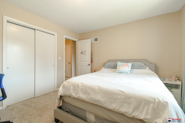 2430 Jameson St S, Lincoln, NE 68512 - bedroom featuring carpet floors and a closet