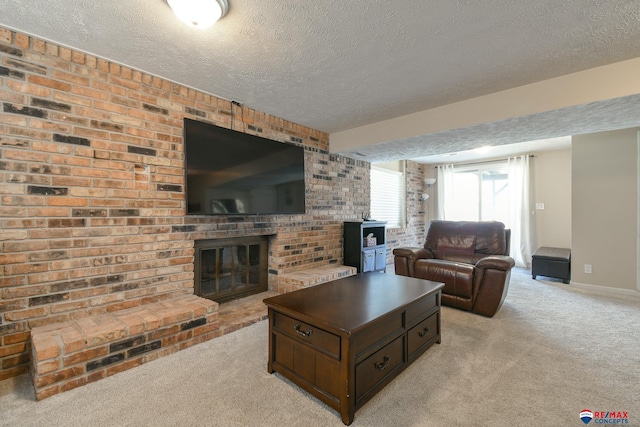 2430 Jameson St S, Lincoln, NE 68512 - living room featuring a textured ceiling, light colored carpet, a brick fireplace, and baseboards