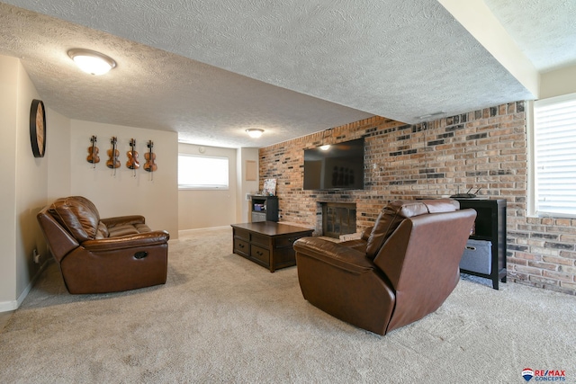 2430 Jameson St S, Lincoln, NE 68512 - living area with a brick fireplace, a textured ceiling, carpet flooring, baseboards, and brick wall