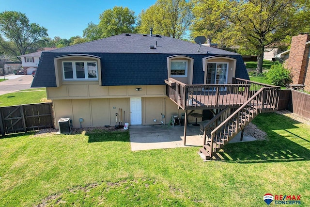 2430 Jameson St S, Lincoln, NE 68512 - back of property featuring a patio area, roof with shingles, stairs, a deck, and board and batten siding
