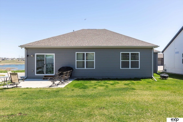 5614 N 177th St, Omaha, NE 68116 - back of house featuring a patio area, a yard, and roof with shingles