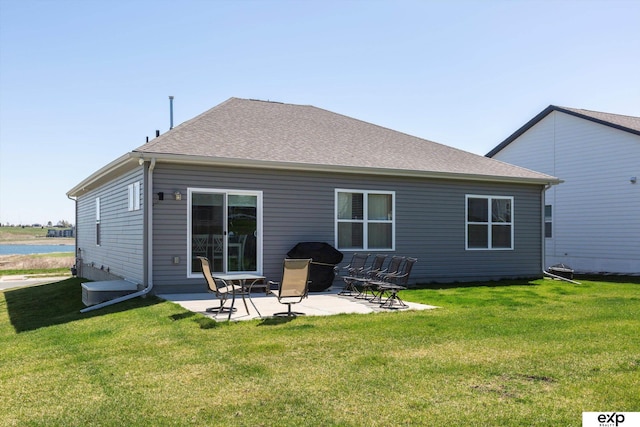 5614 N 177th St, Omaha, NE 68116 - back of house with a patio, a lawn, and roof with shingles