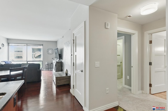 3201 Dodge Ct Unit 5412, Omaha, NE 68131 - hall with wood finished floors and baseboards