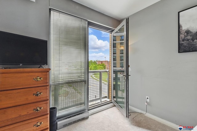 3201 Dodge Ct Unit 5412, Omaha, NE 68131 - unfurnished bedroom featuring light carpet, baseboards, and access to exterior