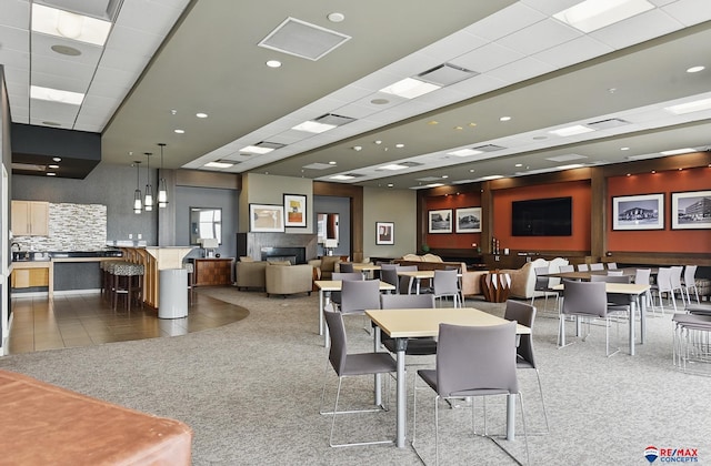 3201 Dodge Ct Unit 5412, Omaha, NE 68131 - carpeted dining area with tile patterned floors