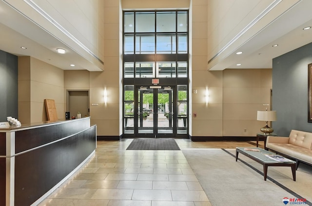 3201 Dodge Ct Unit 5412, Omaha, NE 68131 - reception with a high ceiling, recessed lighting, and french doors