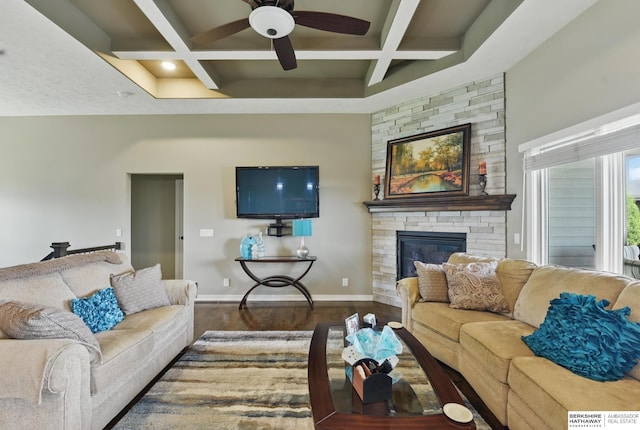235 N 10th Ave, Springfield, NE 68059 - living area with coffered ceiling, ceiling fan, a fireplace, wood finished floors, and baseboards