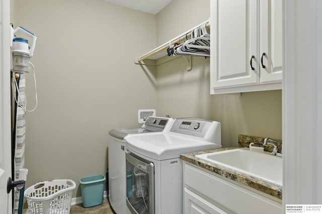 235 N 10th Ave, Springfield, NE 68059 - washroom with washing machine and clothes dryer and cabinet space