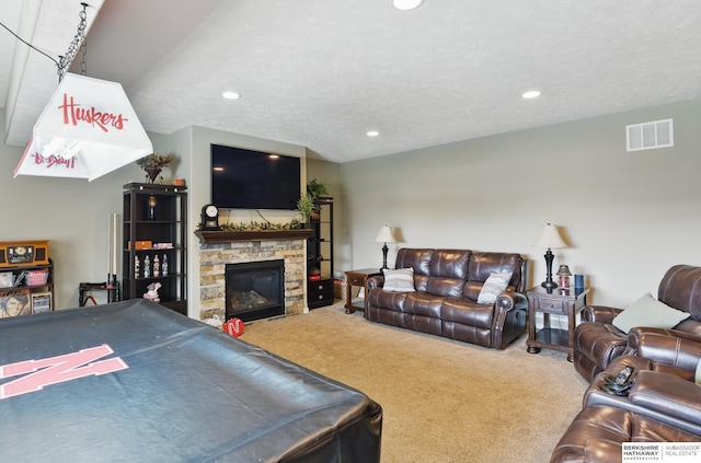 235 N 10th Ave, Springfield, NE 68059 - carpeted living room with recessed lighting and a stone fireplace