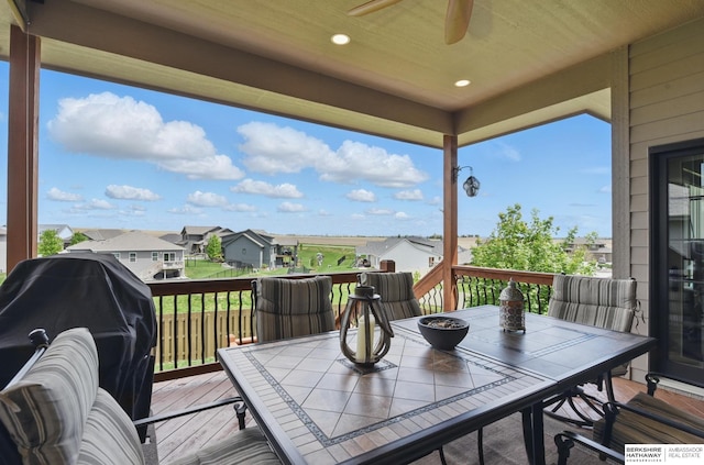 235 N 10th Ave, Springfield, NE 68059 - wooden terrace with a ceiling fan, outdoor dining area, a residential view, and area for grilling