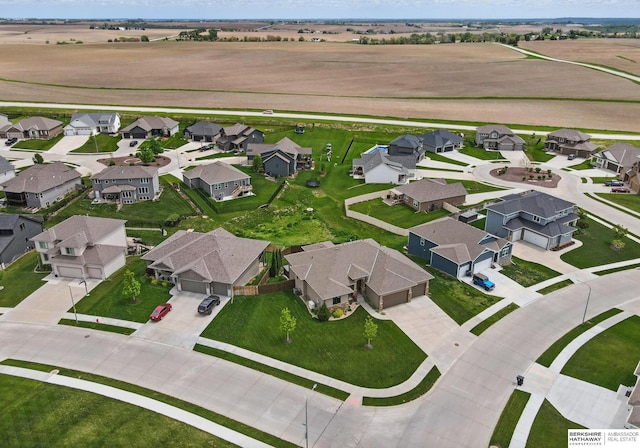 235 N 10th Ave, Springfield, NE 68059 - aerial view of property and surrounding area with nearby suburban area