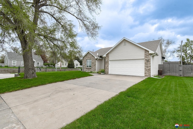 1405 Euclid St, Ashland, NE 68003 - view of front of house featuring an attached garage, driveway, and a shingled roof