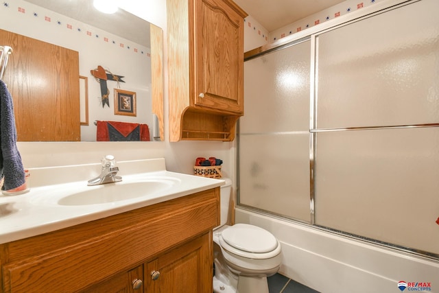 1405 Euclid St, Ashland, NE 68003 - bathroom with vanity, enclosed tub / shower combo, and toilet