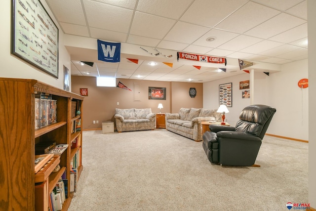 1405 Euclid St, Ashland, NE 68003 - living area featuring a drop ceiling, carpet flooring, and baseboards