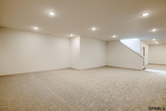 20145 S St, Omaha, NE 68135 - finished below grade area with light colored carpet, recessed lighting, and baseboards