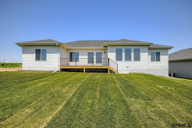 20145 S St, Omaha, NE 68135 - rear view of house featuring a wooden deck, a yard, and a shingled roof