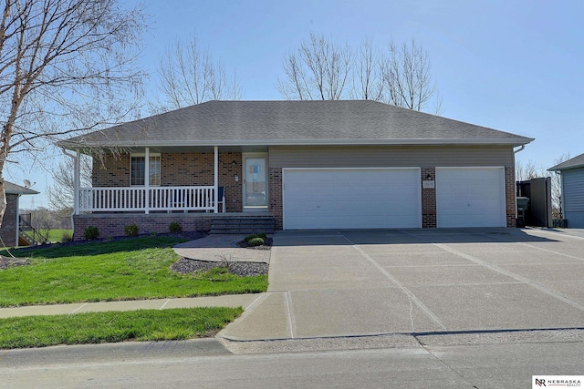 10419 N 150th St, Bennington, NE 68007 - ranch-style house with an attached garage, brick siding, a porch, driveway, and a front yard