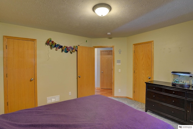 10419 N 150th St, Bennington, NE 68007 - bedroom with carpet flooring and a textured ceiling