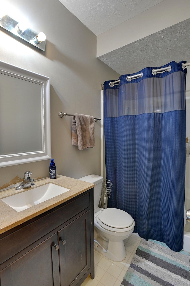 10419 N 150th St, Bennington, NE 68007 - full bath with vanity, toilet, shower / tub combo with curtain, tile patterned flooring, and a textured ceiling