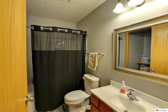 10419 N 150th St, Bennington, NE 68007 - full bath with vanity, toilet, shower / bath combo, and a textured ceiling