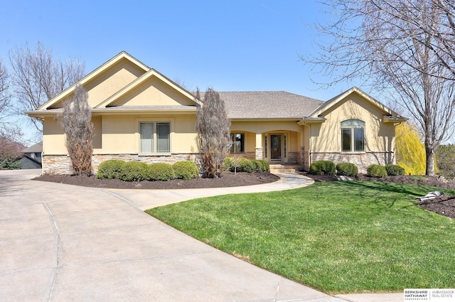 19252 Shirley St, Omaha, NE 68130 - single story home featuring stone siding, stucco siding, a front yard, and a porch