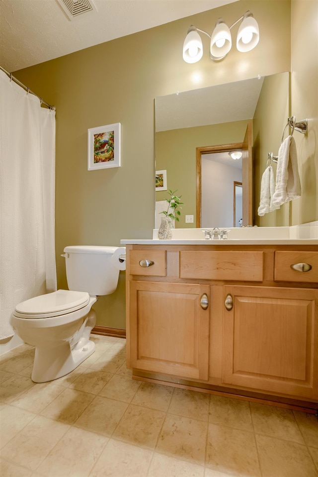 16117 Cottonwood St, Omaha, NE 68136 - full bathroom featuring toilet, vanity, curtained shower, and tile patterned floors
