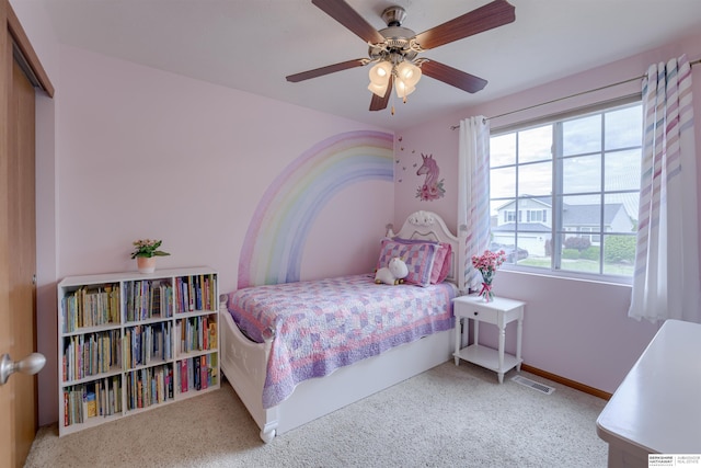 16117 Cottonwood St, Omaha, NE 68136 - carpeted bedroom with a ceiling fan and baseboards